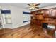 Bedroom with hardwood floors, natural light, and built in desk at 1144 Waterfall Ln # 26, Lakeland, FL 33803