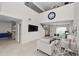 Open concept living room with high ceilings, and modern furnishings and decor at 1144 Waterfall Ln # 26, Lakeland, FL 33803