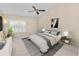 Bedroom featuring a ceiling fan, neutral decor, and natural light at 1144 Waterfall Ln # 26, Lakeland, FL 33803