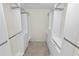 Large walk-in closet with double hanging rods and drawers at 1144 Waterfall Ln # 26, Lakeland, FL 33803