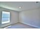 Bright bedroom with a window allowing ample natural light at 5120 Villa Crest Way, Auburndale, FL 33823