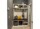Charming mudroom features built-in storage, bench seating, and decorative shelving for a cozy, organized entryway at 2875 Creeks Crossing Blvd, Lakeland, FL 33810