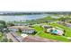 Aerial shot of property featuring pool, lake access, and scenic views at 1600 W Lake Parker Dr # A2, Lakeland, FL 33805