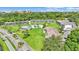 Beautiful aerial view of the condo community, showcasing the pool, landscaping, and building exteriors at 1600 W Lake Parker Dr # A2, Lakeland, FL 33805