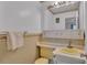 A classic bathroom shows a built in vanity and a toilet at 1600 W Lake Parker Dr # A2, Lakeland, FL 33805