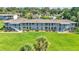 Charming two-story condo building with well-maintained landscaping and bright exterior paint at 1600 W Lake Parker Dr # A2, Lakeland, FL 33805