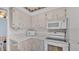 Bright kitchen features white appliances and ample cabinet space at 1600 W Lake Parker Dr # A2, Lakeland, FL 33805