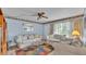 Comfortable living room with sofas and a glass coffee table at 1600 W Lake Parker Dr # A2, Lakeland, FL 33805