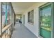 Screened walkway view, leading to entrance with a view of the community at 1600 W Lake Parker Dr # A2, Lakeland, FL 33805