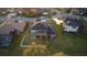 Expansive backyard featuring a white picket fence and mature trees, perfect for outdoor activities and privacy at 7330 Reflections Lake Dr, Lakeland, FL 33813