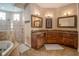 Large Primary bathroom with double vanity and walk-in shower at 7330 Reflections Lake Dr, Lakeland, FL 33813
