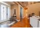 Inviting foyer with decorative glass front door and hardwood floors at 7330 Reflections Lake Dr, Lakeland, FL 33813