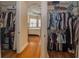 Large walk-in closet with ample shelving and hanging space at 7330 Reflections Lake Dr, Lakeland, FL 33813
