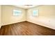 Bedroom featuring wood floors, a ceiling fan, and neutral walls at 3523 Colleen Dr, Lakeland, FL 33810