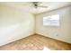 Cozy bedroom with tile floors, a ceiling fan, and a window at 3523 Colleen Dr, Lakeland, FL 33810