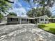Charming single-story home with a well-manicured front yard and a spacious driveway at 3523 Colleen Dr, Lakeland, FL 33810