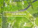 Expansive 14.49 acre property featuring green space, a serene stream, and the potential for customization and development at 1096 Drew St, Lakeland, FL 33810
