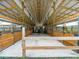 Well-maintained horse barn with multiple stalls and ample room for horses and equipment at 1096 Drew St, Lakeland, FL 33810