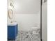 Stylish bathroom features a new vanity with stunning patterned tile flooring at 1096 Drew St, Lakeland, FL 33810