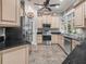 Modern kitchen featuring stainless steel appliances, granite countertops, and ample cabinet space at 1096 Drew St, Lakeland, FL 33810