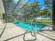 Sparkling screened pool offers a relaxing backyard oasis with beautiful views at 1096 Drew St, Lakeland, FL 33810