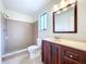 Updated bathroom with a shower, toilet and vanity at 1426 Persimmon Way, Lakeland, FL 33811