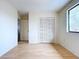 Simple bedroom with closet and access to a bathroom at 1426 Persimmon Way, Lakeland, FL 33811