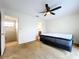 Cozy bedroom with access to stairs and bathroom at 1426 Persimmon Way, Lakeland, FL 33811