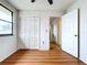 Bedroom with wood flooring, double door closet and window at 1426 Persimmon Way, Lakeland, FL 33811