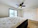 Spacious bedroom with double closet and water view at 1426 Persimmon Way, Lakeland, FL 33811