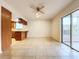 Large dining area with tile floor and access to patio at 1426 Persimmon Way, Lakeland, FL 33811