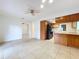 Spacious dining area with tile flooring and access to the kitchen at 1426 Persimmon Way, Lakeland, FL 33811