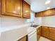 Bright kitchen featuring wood cabinets and tile countertops at 1426 Persimmon Way, Lakeland, FL 33811