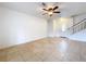 Spacious living area with tile floors and a ceiling fan at 1426 Persimmon Way, Lakeland, FL 33811