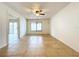 Living room with tile flooring and a view to backyard at 1426 Persimmon Way, Lakeland, FL 33811