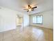 Bright living room with tile floors and sliding glass doors at 1426 Persimmon Way, Lakeland, FL 33811