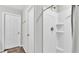 Bathroom featuring a shower stall with glass door at 5528 Arlington River Dr, Lakeland, FL 33811