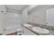 Bathroom with double vanity and shower/tub combo at 5528 Arlington River Dr, Lakeland, FL 33811