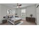 Bedroom with a queen-size bed and dresser at 5528 Arlington River Dr, Lakeland, FL 33811