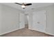 Bedroom with double doors leading to another room at 5528 Arlington River Dr, Lakeland, FL 33811