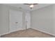 Spacious bedroom with double doors and closet at 5528 Arlington River Dr, Lakeland, FL 33811