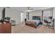 Bedroom with a bed, desk, and en-suite bathroom access at 5528 Arlington River Dr, Lakeland, FL 33811