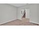 Bright foyer with neutral walls and carpet, showcasing staircase to upper level at 5528 Arlington River Dr, Lakeland, FL 33811