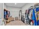 Large walk-in closet with ample shelving and hanging space at 5528 Arlington River Dr, Lakeland, FL 33811