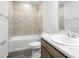 Clean bathroom with shower/tub combo and modern vanity at 631 Bentley North Dr, Auburndale, FL 33823