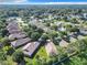 Community aerial showcasing the neighborhood layout, landscaping, and the surrounding area at 665 Lake Clark Pl, Lakeland, FL 33813