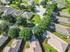Aerial view of a residential neighborhood with well-maintained lawns and mature trees at 665 Lake Clark Pl, Lakeland, FL 33813