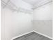 Walk-in closet with wire shelving and wood-look floors at 665 Lake Clark Pl, Lakeland, FL 33813