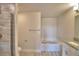 Bathroom featuring a glass-enclosed shower, toilet, tub, and vanity for your convenience at 4538 Grandview Glen Dr, Auburndale, FL 33823