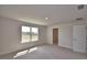 Bedroom featuring neutral walls, carpet flooring, and a window at 4538 Grandview Glen Dr, Auburndale, FL 33823
